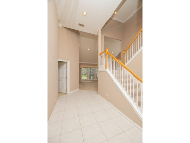 Set In A Quiet Cul-de-sac,This 3-bedroom,2.5-bath Lakefront Home on Marsh Creek Country Club in Florida - for sale on GolfHomes.com, golf home, golf lot