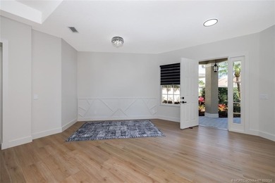 ARCHITECTURAL DIGEST WORTHY!!! EXTENSIVELY REMODELED 3B/2b/2c on  in Florida - for sale on GolfHomes.com, golf home, golf lot