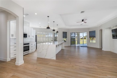 ARCHITECTURAL DIGEST WORTHY!!! EXTENSIVELY REMODELED 3B/2b/2c on  in Florida - for sale on GolfHomes.com, golf home, golf lot