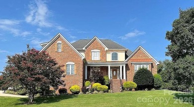 This beautiful custom home is located in the desirable Larkin on Fox Den Country Club in North Carolina - for sale on GolfHomes.com, golf home, golf lot