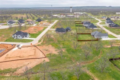 Howdy! Build your dream home on this beautiful pie-shaped lot on Pecan Plantation Country Club in Texas - for sale on GolfHomes.com, golf home, golf lot