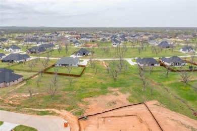 Howdy! Build your dream home on this beautiful pie-shaped lot on Pecan Plantation Country Club in Texas - for sale on GolfHomes.com, golf home, golf lot
