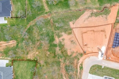 Howdy! Build your dream home on this beautiful pie-shaped lot on Pecan Plantation Country Club in Texas - for sale on GolfHomes.com, golf home, golf lot