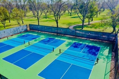 Howdy! Build your dream home on this beautiful pie-shaped lot on Pecan Plantation Country Club in Texas - for sale on GolfHomes.com, golf home, golf lot