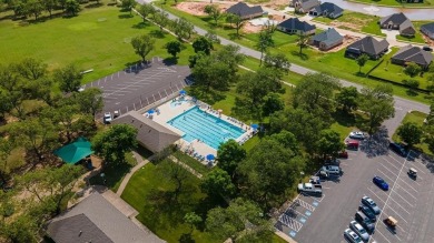 Howdy! Build your dream home on this beautiful pie-shaped lot on Pecan Plantation Country Club in Texas - for sale on GolfHomes.com, golf home, golf lot