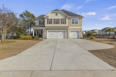 Beautifully maintained Wadsworth Mungo two-story home located in on Beau Rivage Golf and Resort in North Carolina - for sale on GolfHomes.com, golf home, golf lot