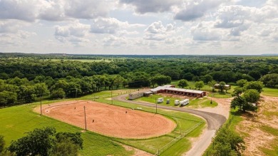 Howdy! Build your dream home on this beautiful pie-shaped lot on Pecan Plantation Country Club in Texas - for sale on GolfHomes.com, golf home, golf lot