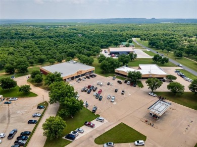 Howdy! Build your dream home on this beautiful pie-shaped lot on Pecan Plantation Country Club in Texas - for sale on GolfHomes.com, golf home, golf lot