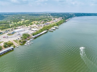 Howdy! Build your dream home on this beautiful pie-shaped lot on Pecan Plantation Country Club in Texas - for sale on GolfHomes.com, golf home, golf lot