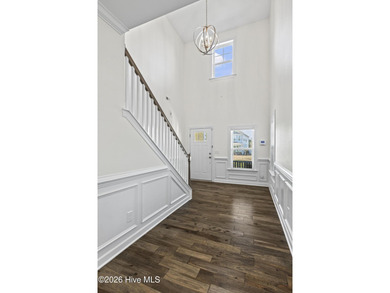 Beautifully maintained Wadsworth Mungo two-story home located in on Beau Rivage Golf and Resort in North Carolina - for sale on GolfHomes.com, golf home, golf lot