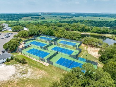 Howdy! Build your dream home on this beautiful pie-shaped lot on Pecan Plantation Country Club in Texas - for sale on GolfHomes.com, golf home, golf lot