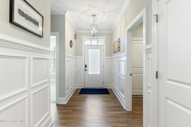 This like new, charming residence, built in 2023 by Bill Clark on Compass Pointe Golf Course in North Carolina - for sale on GolfHomes.com, golf home, golf lot