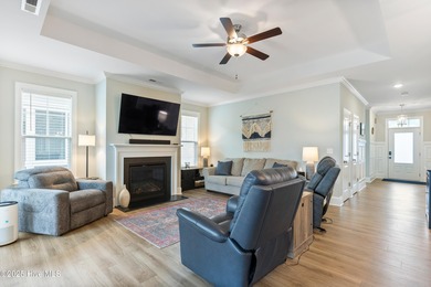 This like new, charming residence, built in 2023 by Bill Clark on Compass Pointe Golf Course in North Carolina - for sale on GolfHomes.com, golf home, golf lot