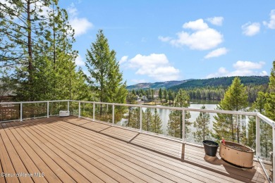 Perched on the peaceful shores of Sans Souci Lake, this on Stoneridge Golf Club in Idaho - for sale on GolfHomes.com, golf home, golf lot