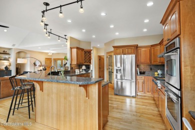 Perched on the peaceful shores of Sans Souci Lake, this on Stoneridge Golf Club in Idaho - for sale on GolfHomes.com, golf home, golf lot