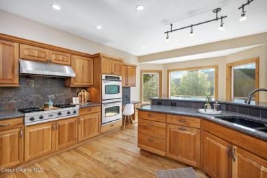 Perched on the peaceful shores of Sans Souci Lake, this on Stoneridge Golf Club in Idaho - for sale on GolfHomes.com, golf home, golf lot
