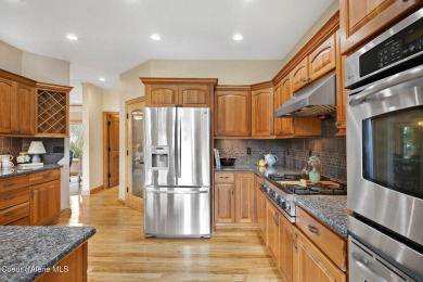 Perched on the peaceful shores of Sans Souci Lake, this on Stoneridge Golf Club in Idaho - for sale on GolfHomes.com, golf home, golf lot