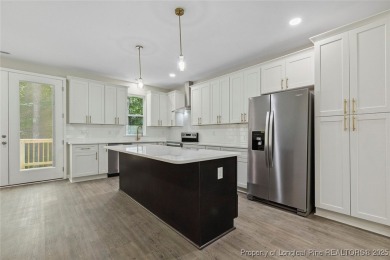 Easy living with this open floor plan, new construction in the on Carolina Trace Country Club in North Carolina - for sale on GolfHomes.com, golf home, golf lot