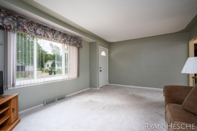 Charming 3-bedroom, 2-bath ranch-style home with full basement on L.E. Kaufman Golf Course in Michigan - for sale on GolfHomes.com, golf home, golf lot
