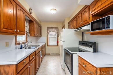 Charming 3-bedroom, 2-bath ranch-style home with full basement on L.E. Kaufman Golf Course in Michigan - for sale on GolfHomes.com, golf home, golf lot