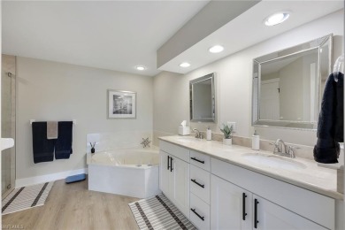 This beautiful three-bedroom, two-bath first-floor home is in on Bonita Bay West in Florida - for sale on GolfHomes.com, golf home, golf lot