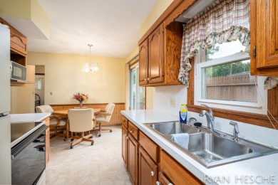 Charming 3-bedroom, 2-bath ranch-style home with full basement on L.E. Kaufman Golf Course in Michigan - for sale on GolfHomes.com, golf home, golf lot