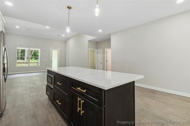 Easy living with this open floor plan, new construction in the on Carolina Trace Country Club in North Carolina - for sale on GolfHomes.com, golf home, golf lot