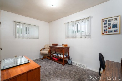 Charming 3-bedroom, 2-bath ranch-style home with full basement on L.E. Kaufman Golf Course in Michigan - for sale on GolfHomes.com, golf home, golf lot