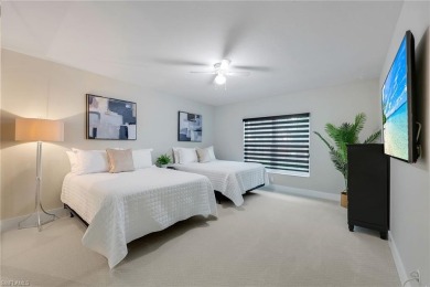 This beautiful three-bedroom, two-bath first-floor home is in on Bonita Bay West in Florida - for sale on GolfHomes.com, golf home, golf lot