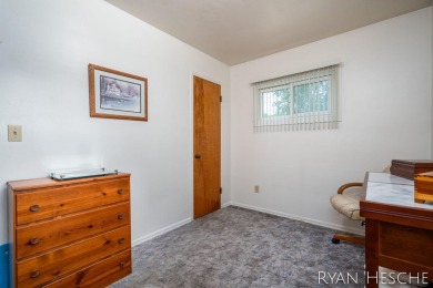 Charming 3-bedroom, 2-bath ranch-style home with full basement on L.E. Kaufman Golf Course in Michigan - for sale on GolfHomes.com, golf home, golf lot