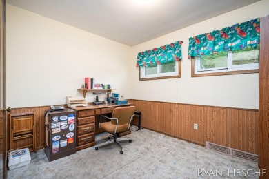Charming 3-bedroom, 2-bath ranch-style home with full basement on L.E. Kaufman Golf Course in Michigan - for sale on GolfHomes.com, golf home, golf lot