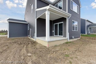 Welcome to this stunning new construction colonial in Macomb on Cracklewood Golf Club in Michigan - for sale on GolfHomes.com, golf home, golf lot