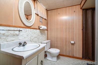 Charming 3-bedroom, 2-bath ranch-style home with full basement on L.E. Kaufman Golf Course in Michigan - for sale on GolfHomes.com, golf home, golf lot