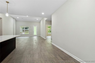 Easy living with this open floor plan, new construction in the on Carolina Trace Country Club in North Carolina - for sale on GolfHomes.com, golf home, golf lot