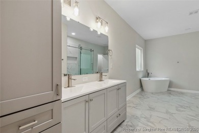 Easy living with this open floor plan, new construction in the on Carolina Trace Country Club in North Carolina - for sale on GolfHomes.com, golf home, golf lot
