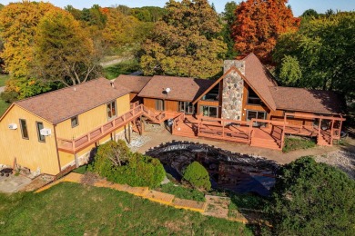 This stunning property offers the perfect blend of luxury and on Hickory Creek Golf Course in Michigan - for sale on GolfHomes.com, golf home, golf lot