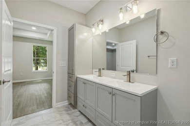 Easy living with this open floor plan, new construction in the on Carolina Trace Country Club in North Carolina - for sale on GolfHomes.com, golf home, golf lot