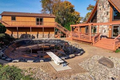 This stunning property offers the perfect blend of luxury and on Hickory Creek Golf Course in Michigan - for sale on GolfHomes.com, golf home, golf lot