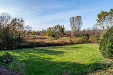 This stunning property offers the perfect blend of luxury and on Hickory Creek Golf Course in Michigan - for sale on GolfHomes.com, golf home, golf lot