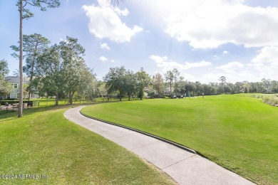 This elegant two story sits on a spectacular half-acre corner on St. Johns Golf and Country Club in Florida - for sale on GolfHomes.com, golf home, golf lot