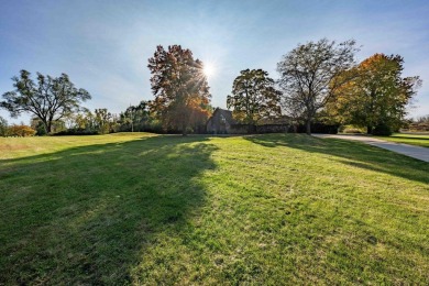 This stunning property offers the perfect blend of luxury and on Hickory Creek Golf Course in Michigan - for sale on GolfHomes.com, golf home, golf lot