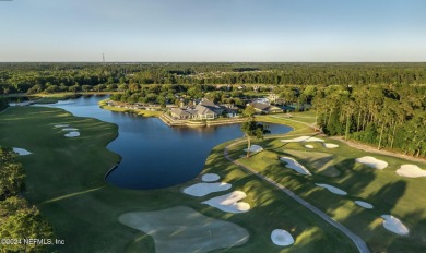 This elegant two story sits on a spectacular half-acre corner on St. Johns Golf and Country Club in Florida - for sale on GolfHomes.com, golf home, golf lot