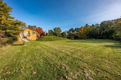 This stunning property offers the perfect blend of luxury and on Hickory Creek Golf Course in Michigan - for sale on GolfHomes.com, golf home, golf lot