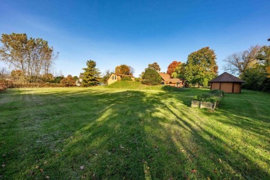 This stunning property offers the perfect blend of luxury and on Hickory Creek Golf Course in Michigan - for sale on GolfHomes.com, golf home, golf lot