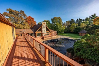 This stunning property offers the perfect blend of luxury and on Hickory Creek Golf Course in Michigan - for sale on GolfHomes.com, golf home, golf lot