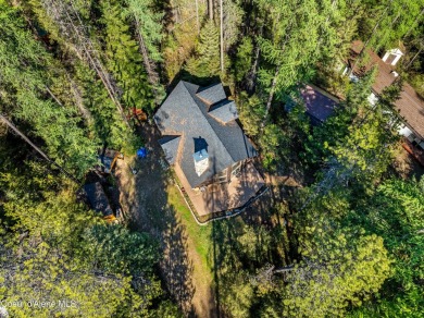 Beautiful year-round cedar home in the desirable Shady Pines on Priest Lake Golf and Tennis Club in Idaho - for sale on GolfHomes.com, golf home, golf lot