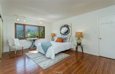 Welcome to this charming 3-bedroom, 2-bathroom hillside retreat on Chevy Chase Country Club in California - for sale on GolfHomes.com, golf home, golf lot