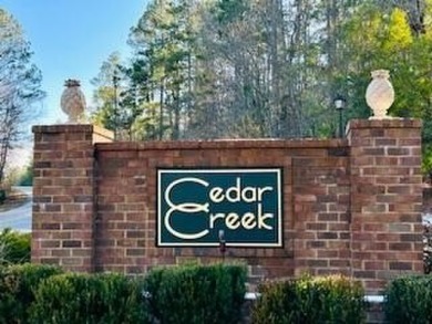 Come build your dream home on this beautiful, wooded, corner lot on The Golf Club At Cedar Creek in South Carolina - for sale on GolfHomes.com, golf home, golf lot