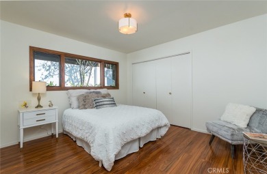 Welcome to this charming 3-bedroom, 2-bathroom hillside retreat on Chevy Chase Country Club in California - for sale on GolfHomes.com, golf home, golf lot