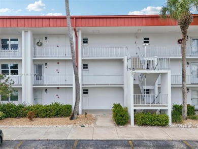 This updated, fully furnished 2nd-floor unit overlooks the 2nd on Seven Lakes Golf and Tennis Community in Florida - for sale on GolfHomes.com, golf home, golf lot